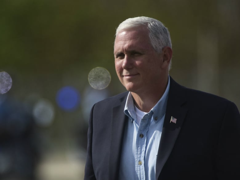 U.S. Vice President Mike Pence arrives at the Muniz National Guard Air Base, in San Juan, Puerto Rico, Friday, Oct. 6, 2017